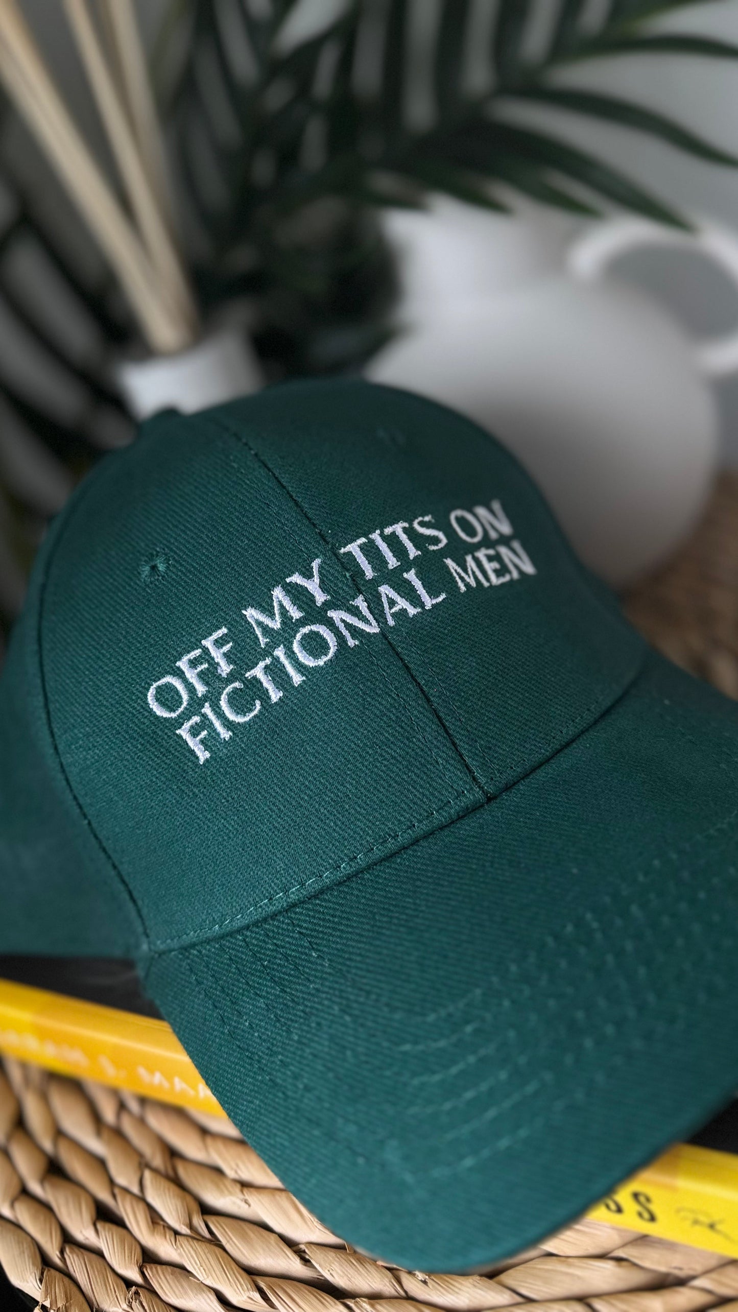 Off my tits on fictional men Embroidered Cap